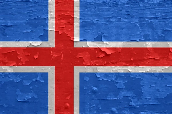 Eski soyulmuş ahşap yüzeyde İzlanda bayrağı. — Stok fotoğraf
