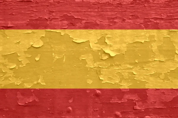 Espanha bandeira em uma superfície de madeira velha com pintura de descascamento . — Fotografia de Stock