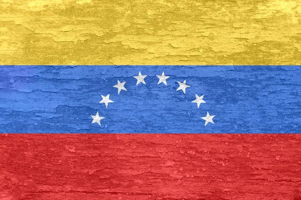 Venezuela-Fahne auf einer alten bemalten Holzoberfläche. — Stockfoto