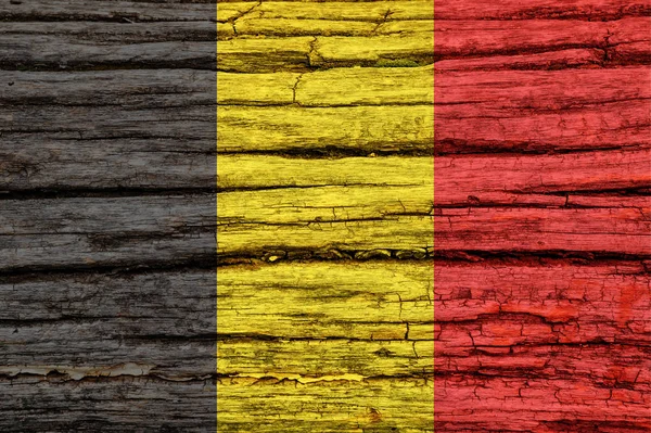 Flag of Belgium on an old wooden surface. — Stock Photo, Image