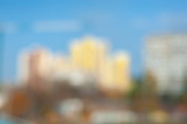 Bokeh efektli bulanık şehir arkaplanı. Şehir manzarasının bulanık, yumuşak görüntüsü.