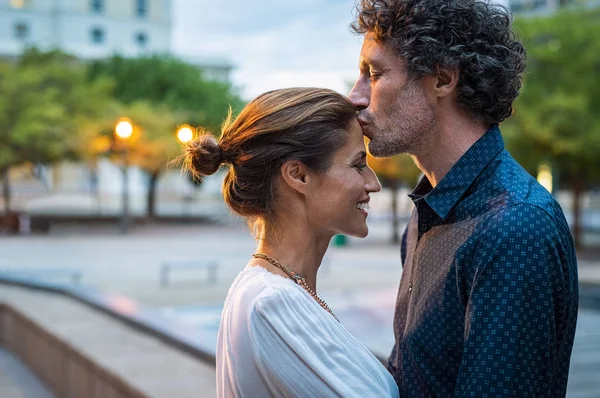 Mature Husband Kissing Wife Forehead Street Evening Romantic Senior Man — Stock Photo, Image