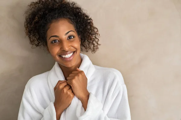 Happy smiling woman in bathrobe at luxury spa — Stock Photo, Image