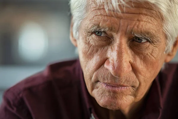 Thoughtful Senior Man Sitting Couch Looking Away Copy Space Depressed — Stock Photo, Image