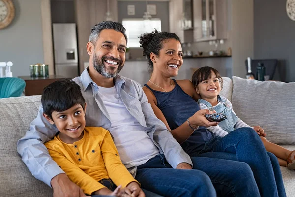 Happy Indian Man African Woman Relaxing Daughter Son Watching Television — Stock Photo, Image