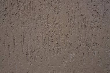 Kaba sarı doku duvar.