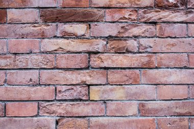 Kırmızı tuğla duvar çizikler doku ile.