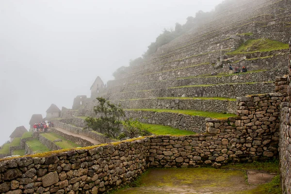 View of ruins and agriculture terraces at dawn.