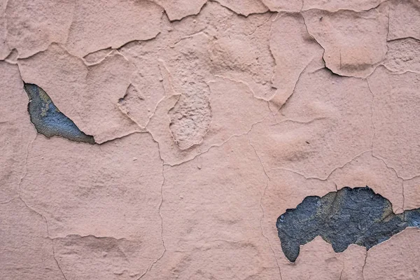 Pęknięty łososia ścian betonowych. — Zdjęcie stockowe