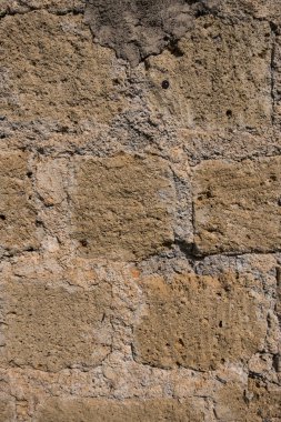 Eski kare beton tuğla duvar.