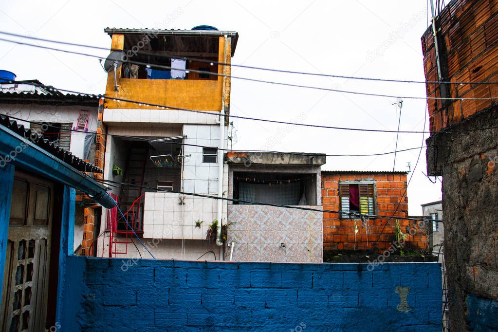 Poor houses of a shanty town in Brazil from a terrace.