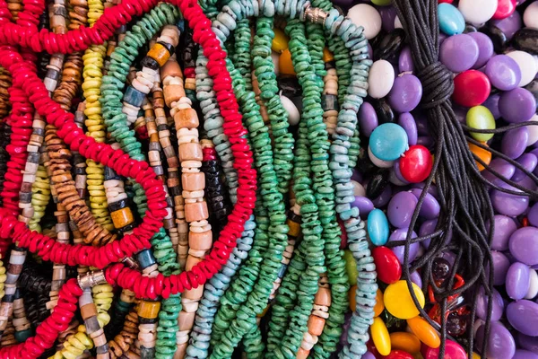 Colorful beads and fake coral necklaces. — Stock Photo, Image