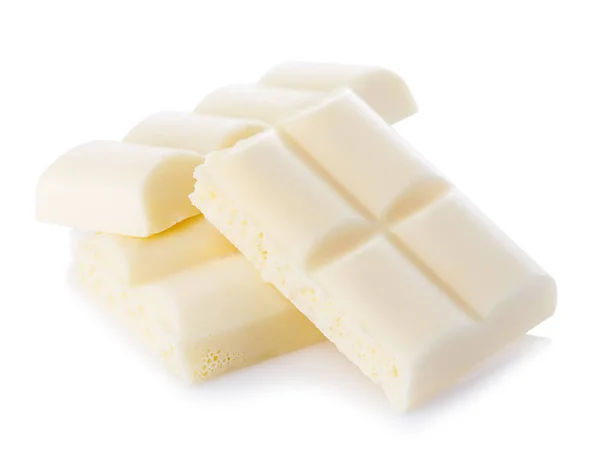 白い背景に分離されたホワイト チョコレートの部分のクローズ アップ — ストック写真