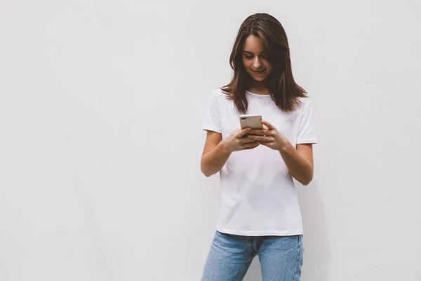 Smiling Happy Hipster Girl Wearing White Shirt Using Mobile Smartphone — Stock Photo, Image