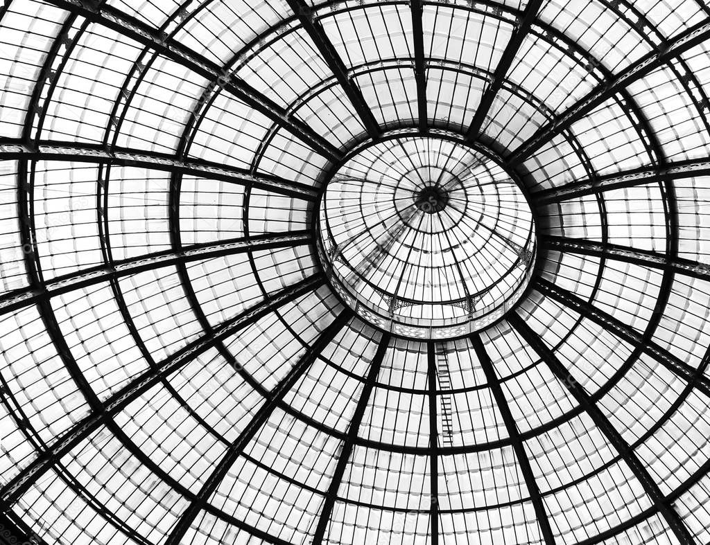 Glass dome of Galleria Vittorio Emanuele II shopping gallery. Milan, Italy - black and white version