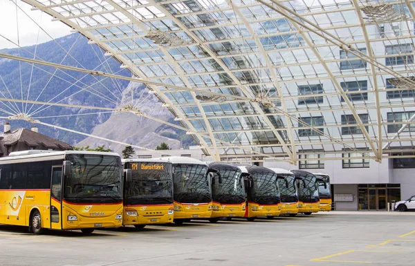 Chur, Switzerland - 22 September, 2018: Post Buses at the Chur bus station. Post Bus Switzerland under the management of Swiss Post, covers rural regions passenger transportation services in Switzerland.