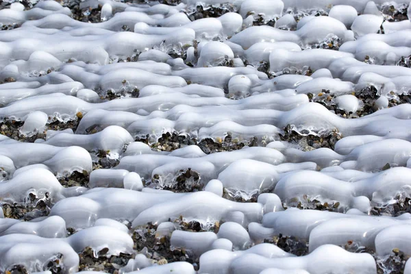 Intressanta Mönster Från Och Snö Som Täcker Småsten Sea Side — Stockfoto