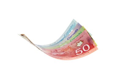 Beyaz arka plan üzerinde izole havada uçan olarak sunulan Kanada Doları faturaları