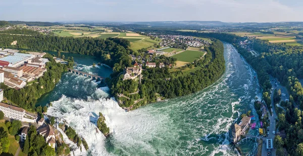 Aerial panorama by drone of Rhine Falls with Schloss Laufen castle, Switzerland. Rhine Falls is the largest waterfalls in Europe