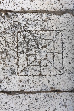 Hırvatistan 'ın Hvar adasındaki antik bir şeride Dokuz Erkekler Morris' in oyun tahtası oyuldu