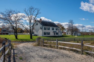 MIDDLETOWN NEW JERSEY - NOVEMBER 3 - The historic Seabrook Wilson home dating back to 1720 as seen on November 3 2018 in Bayshore Waterfront Park in Middletown NJ. clipart