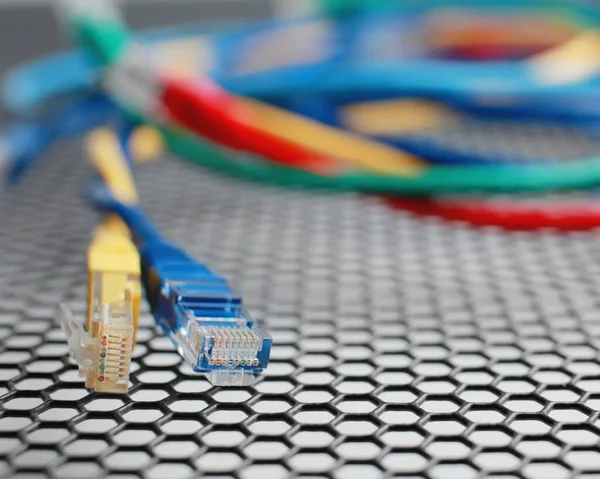 Network Ethernet Cables. Network switch with optical and ethernet connected wires. High quality photo