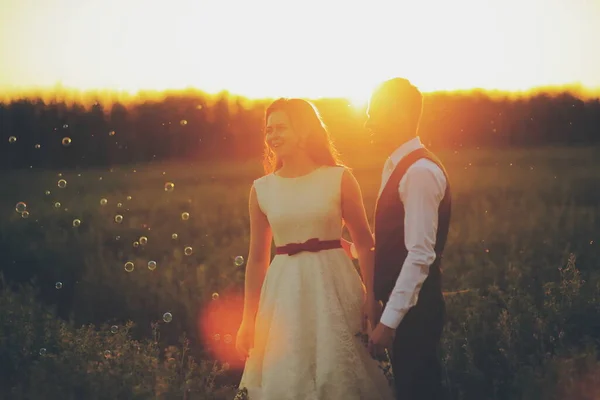 Bride Groom Hold Hands Walk Park Sunset Light Bubble Wedding — Stock Photo, Image