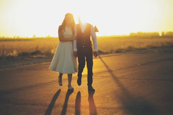 Bride Groom Hold Hands Hug Each Other Walk Park Sunset — Stock Photo, Image