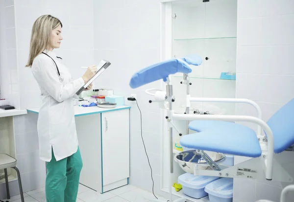 Female Doctor Nurse Uniform Making Notes Medical Form Patient Medical — Stock Photo, Image