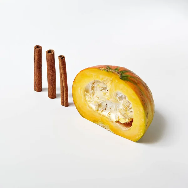 Macro Photo of Healthy Food Ingredients or Breakfast Components Isolated. Minimal Creative Layout Concept with Orange Organic Butternut Squash Pieces Lined Up in a Diagonal Row Close Up