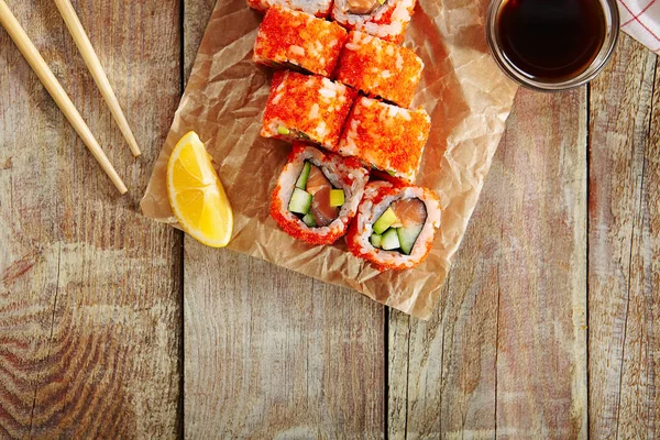 California Sushi Roll with Cucumber Avocado and Salmon Inside — Stock Photo, Image