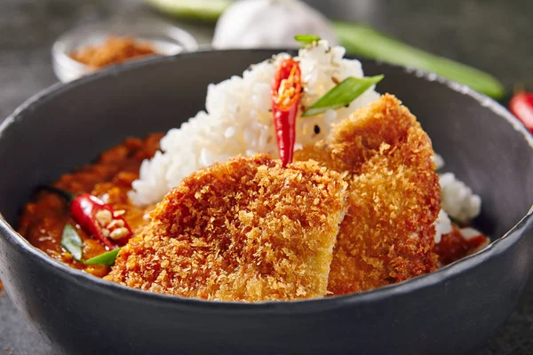 Hot Spicy Crispy Fried Pork Fillet with Curry and Rice on Dark B — Stock Photo, Image