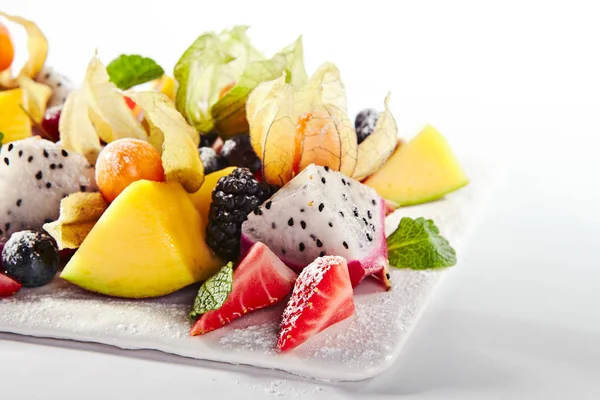 Exotic Fruit Plate or Vegan Platter with Sliced Fruits and Berri