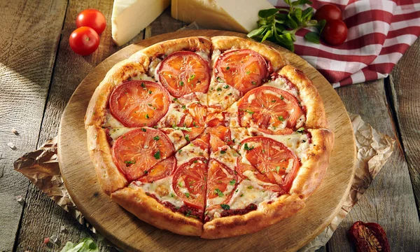 Pizza Restaurant Menu - Delicious Fresh Margarita Pizza with. Pizza on Rustic Wooden Table with Ingredients