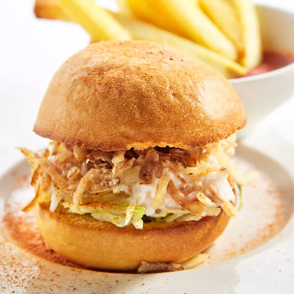 Burger with crab meat and french fries closeup — Stock Photo, Image