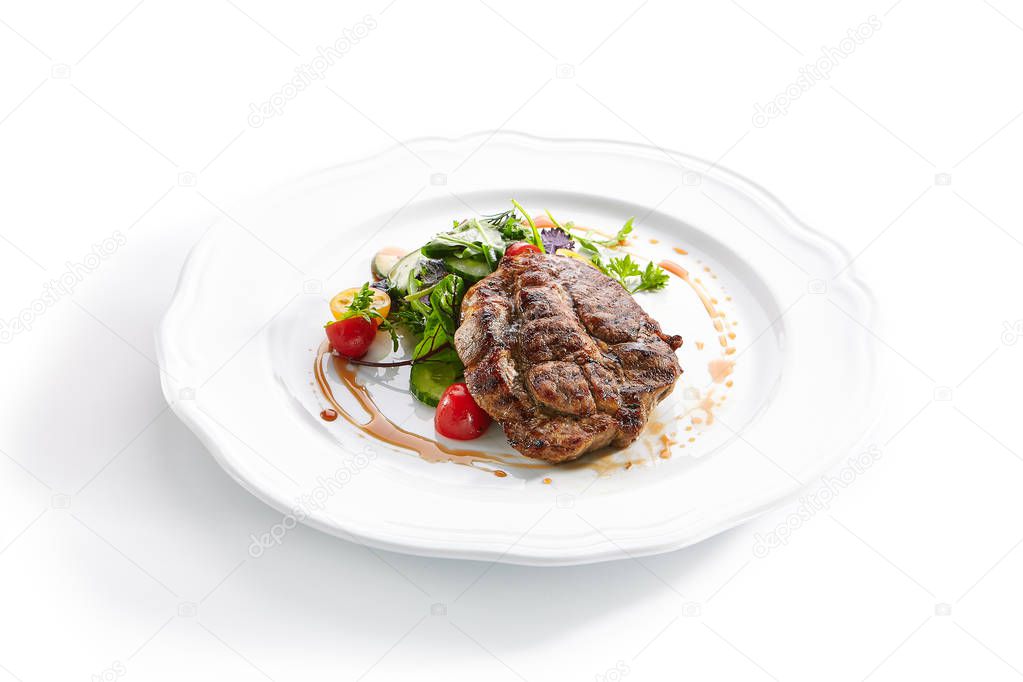 Pork Neck Steak with Mixed Salad on White Restaurent Plate
