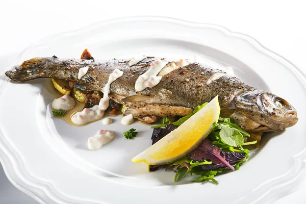 Rainbow Trout on a Vegetable Pillow with Creamy Caviar Sauce — Stock Photo, Image