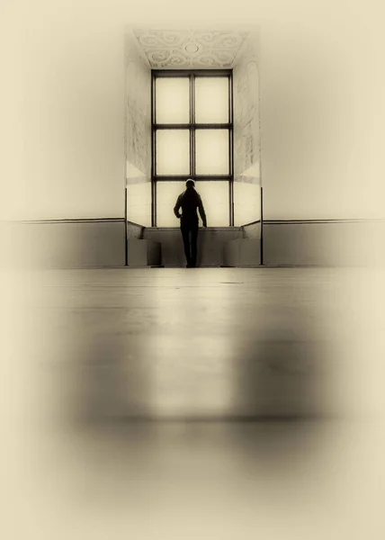 Artistic textured image of  woman silhouette standing in front o — Stock Photo, Image
