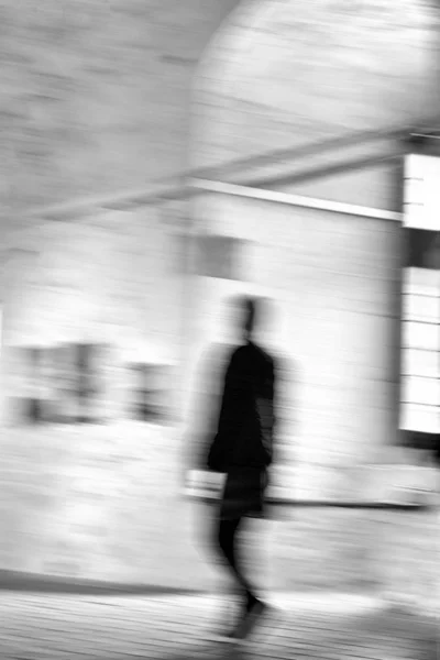 Silhouette of man on the move in motion blur. — Stock Photo, Image