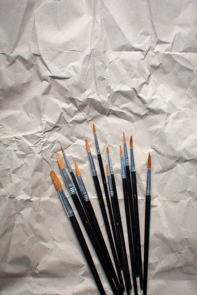 Set Pinceles Artísticos Sobre Papel Color Natural — Foto de Stock