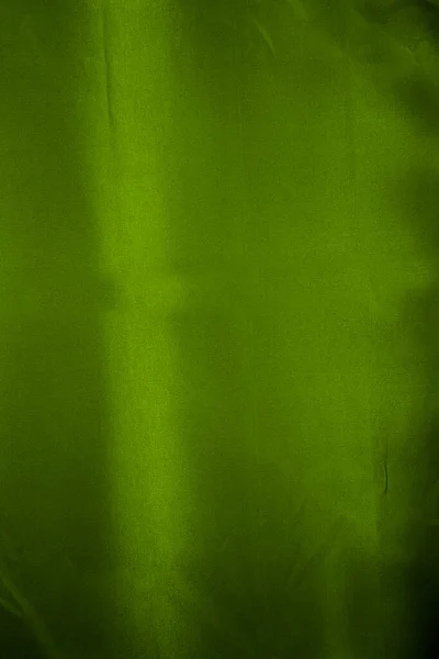 Glänzender Hintergrund Leuchtend Grünem Stoff — Stockfoto