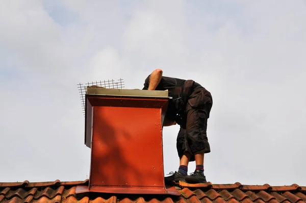 Unrecognizable Modern Chimney Sweep Checking Out Chimney See Needs Repair Stock Photo