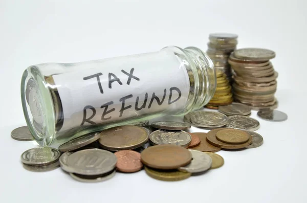 Tax Refund Lable Glass Jar Coins Spilling Out Isolated White — Stock Photo, Image