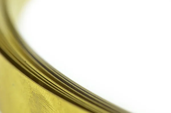 Golden Brass Metal Stripon White Background Selective Focus — Stock Photo, Image
