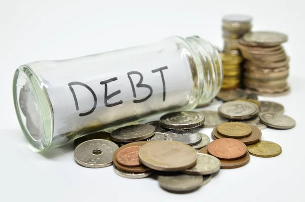 Debt Lable Glass Jar Coins Spilling Out Isolated White Background — Stock Photo, Image