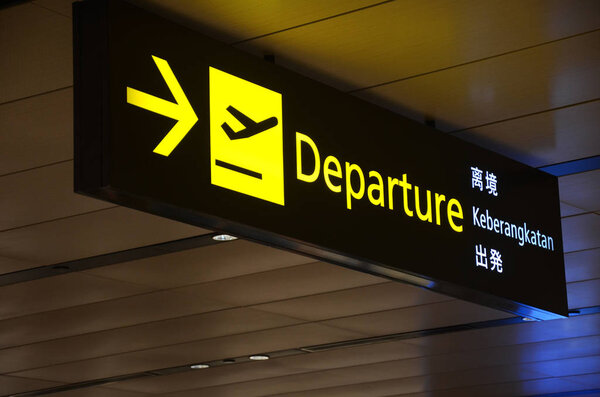 Departure sign at Changi Airport Terminal 1 departure hall