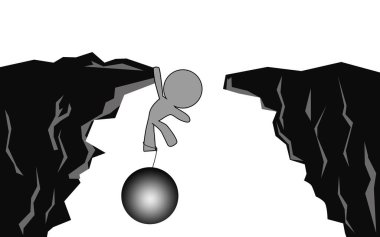 Metal top ve zincir ile uçurumda asılı 