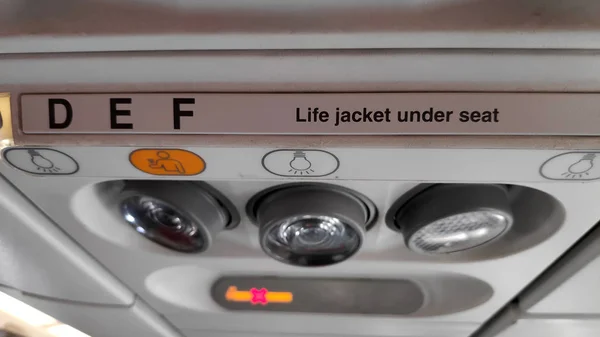 Life jacket under your seat sign — Stock Photo, Image