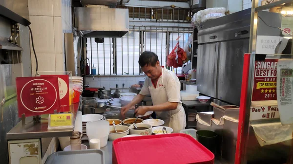 Unidentified chef cooking pork noodle for sale at local street f — Stock Photo, Image