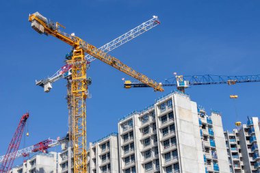 Singapur-6 Sep 2025: Singapur HDB dairelerinin inşaatı. Bu siteler Singapur 'un farklı kentsel ve banliyö bölgelerinde yer almaktadır.